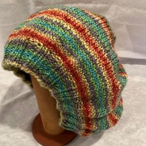 Super cute slouchy beanie!! Hand knit & can accommodate a lot or a little hair!